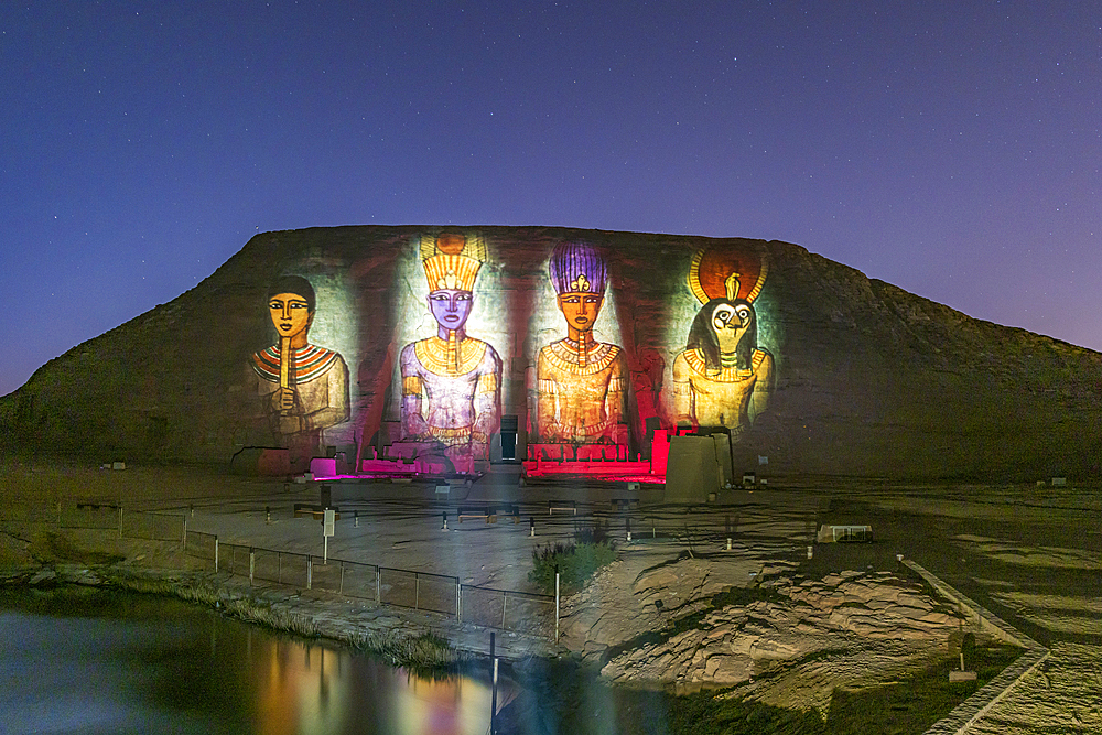 Abu Simbel, Aswan, Egypt. February 22, 2022. Night time light show projected onto the Great Temple of Ramesses II.