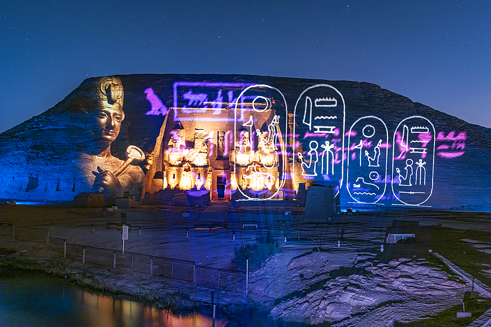 Abu Simbel, Aswan, Egypt. February 22, 2022. Night time light show projected onto the Great Temple of Ramesses II.