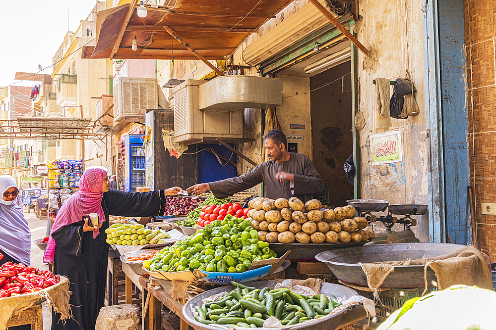 Thebes, Luxor, Egypt. February 24, 2022. Vegetable vendor at a market in Luxor.