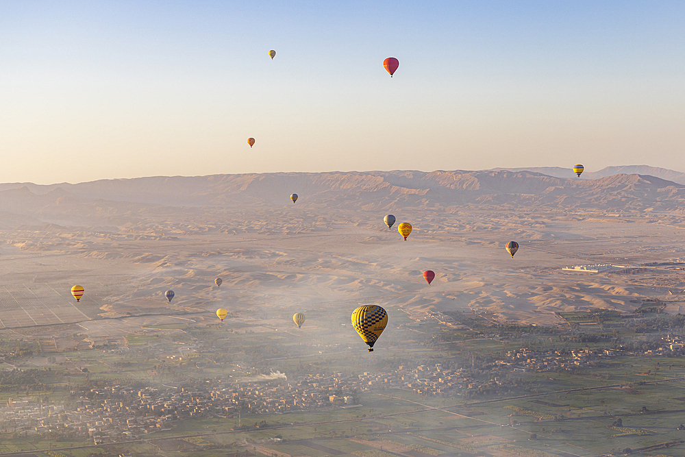 Luxor, Egypt. February 26, 2022. Hot air balloons taking tourist for a ride at Luxor.