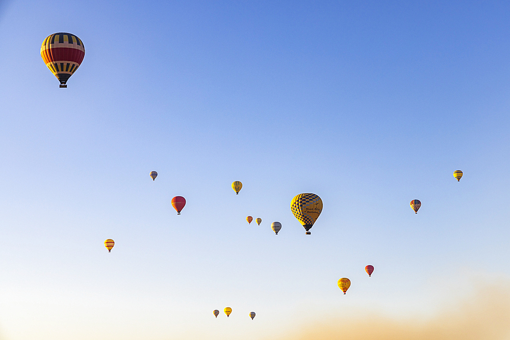 Luxor, Egypt. February 26, 2022. Hot air balloons taking tourist for a ride at Luxor.