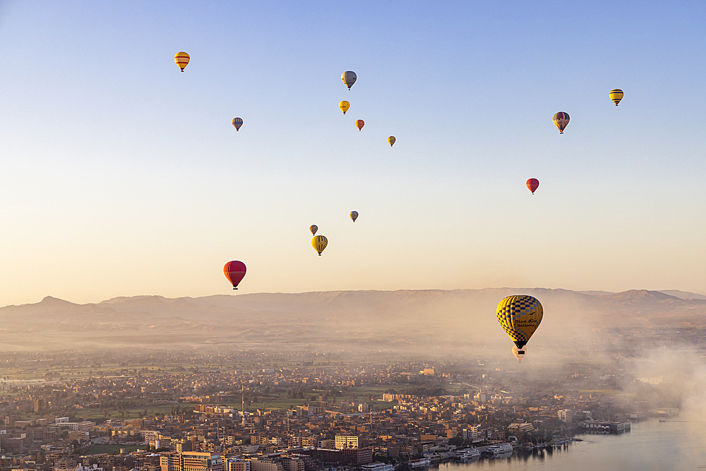 Luxor, Egypt. February 26, 2022. Hot air balloons taking tourist for a ride at Luxor.