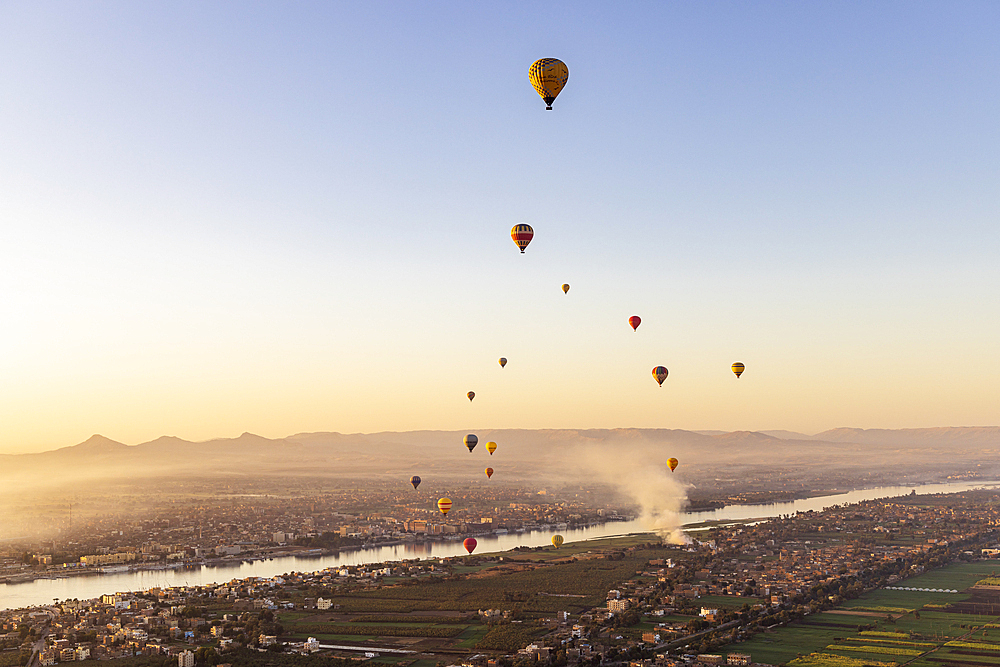 Luxor, Egypt. February 26, 2022. Hot air balloons taking tourist for a ride at Luxor.