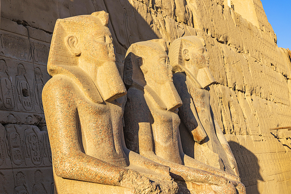 Karnak, Luxor, Egypt. Seated statues at the Karnak Temple complex in Luxor.