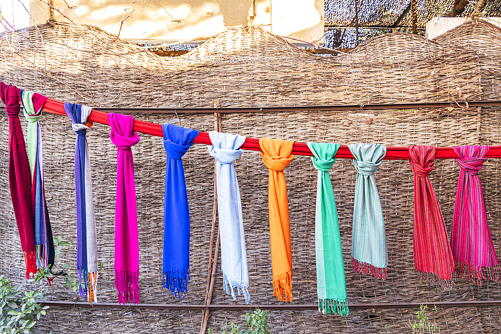 Thebes, Luxor, Egypt. Colorful scarves hanging on a line in Luxor.