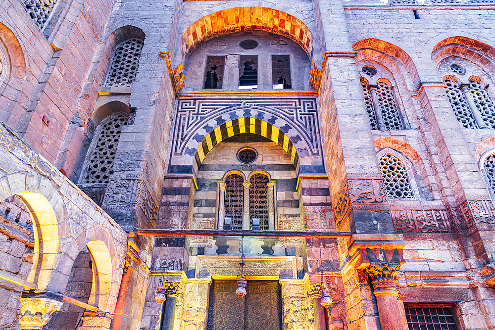 Cairo, Egypt. Entrance to a historic mosque on El Moez street in Old Cairo.