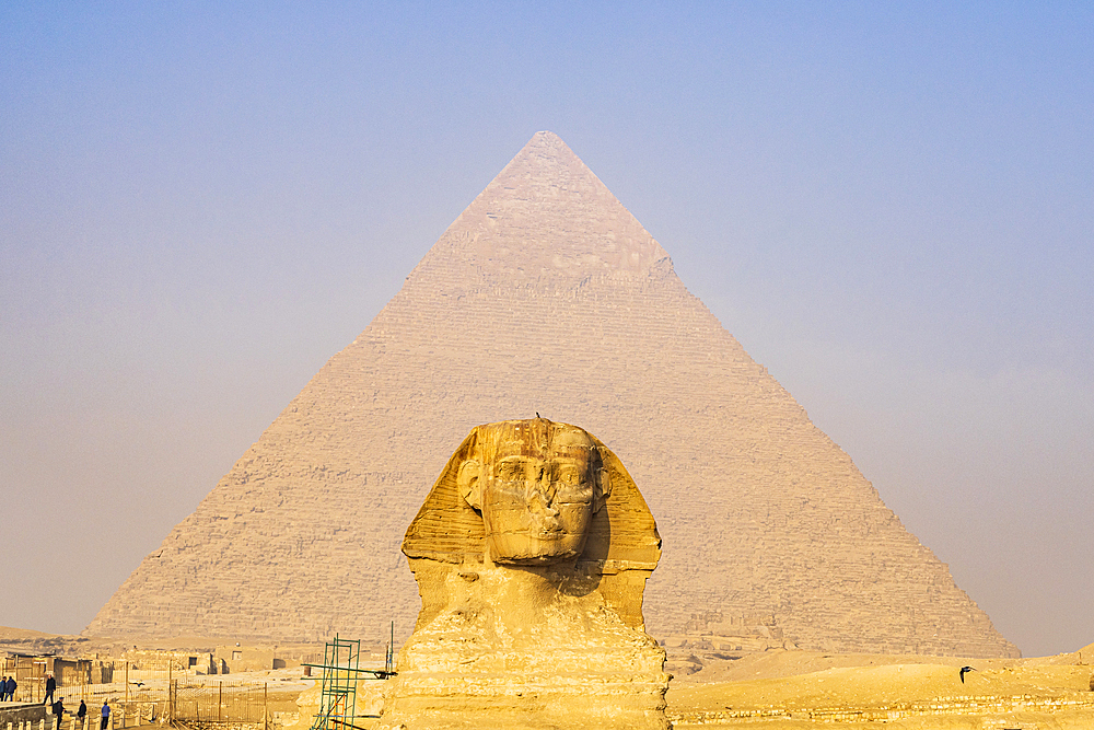 Giza, Cairo, Egypt. The Great Sphinx and the Pyramid of Khafre in Giza.