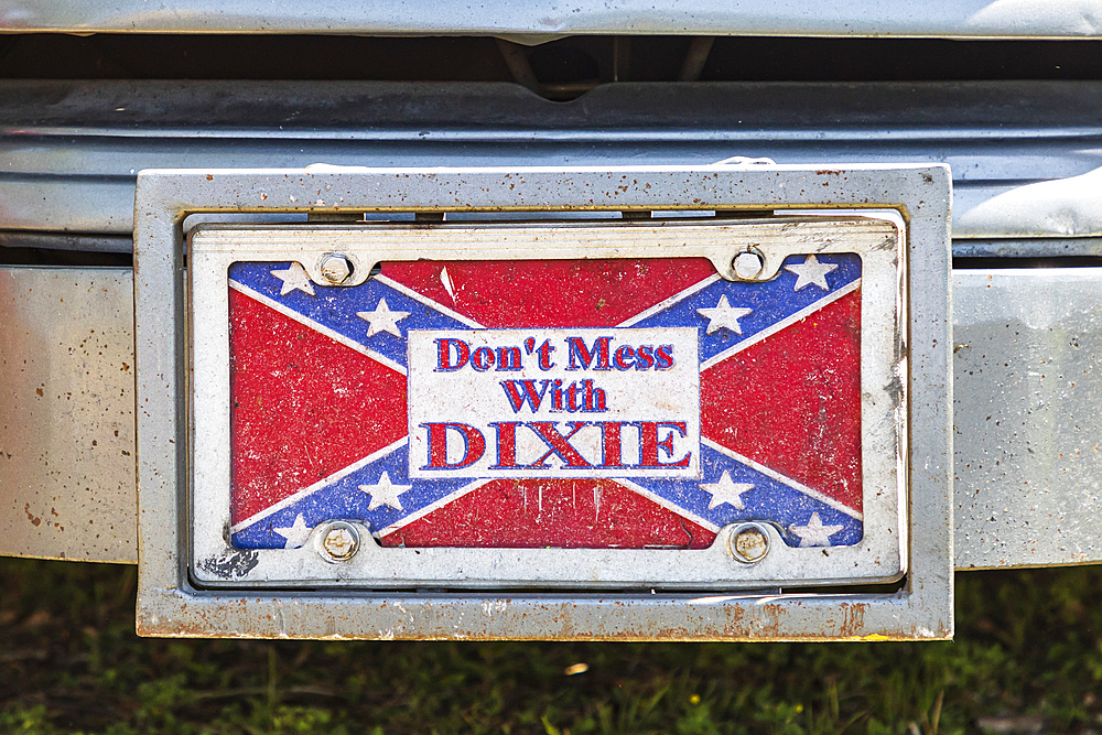 Marble Falls, Texas, USA. April 10, 2021. Decorative license plate with a Confederate flag, saying "Don't Mess with Dixie.".