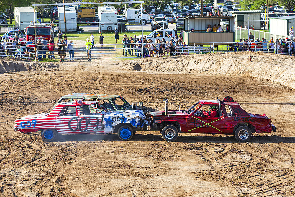 Burnet, Texas, USA. April 10, 2021. Competitors in the county fair demolition derby in Burnet, Texas.