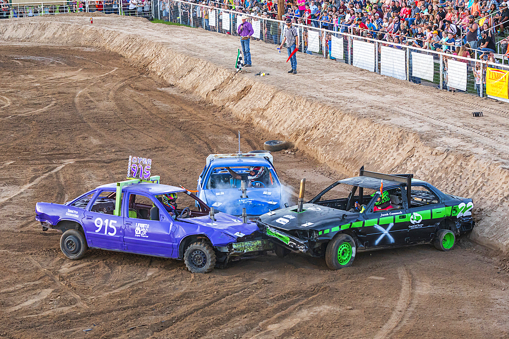 Burnet, Texas, USA. April 10, 2021. Competitors in the county fair demolition derby in Burnet, Texas.