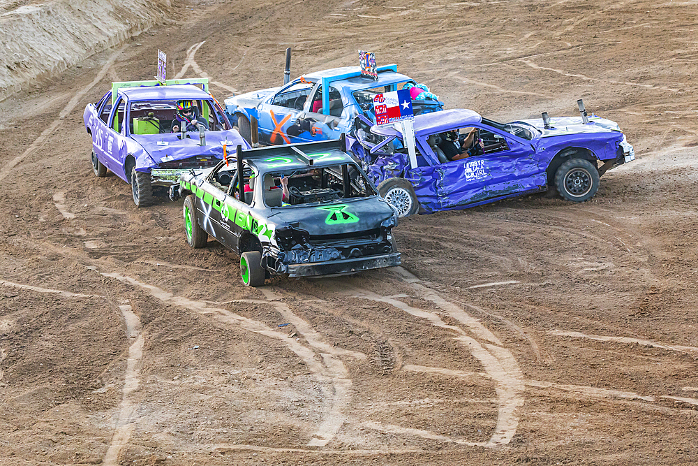 Burnet, Texas, USA. April 10, 2021. Competitors in the county fair demolition derby in Burnet, Texas.