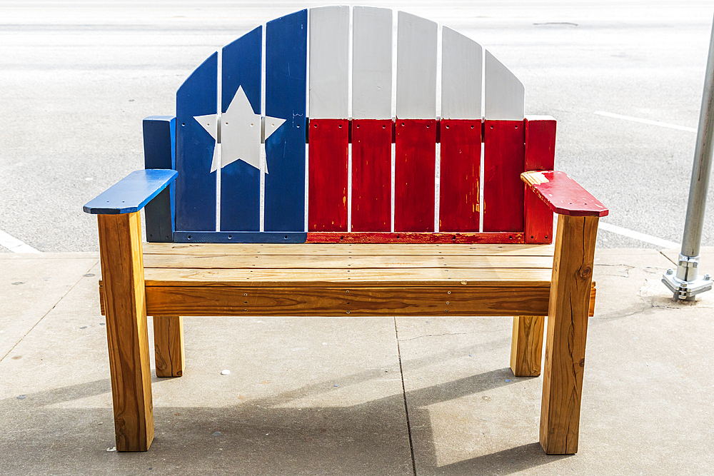 Fredericksburg, Texas, USA. Bench painted like the Texas flag.