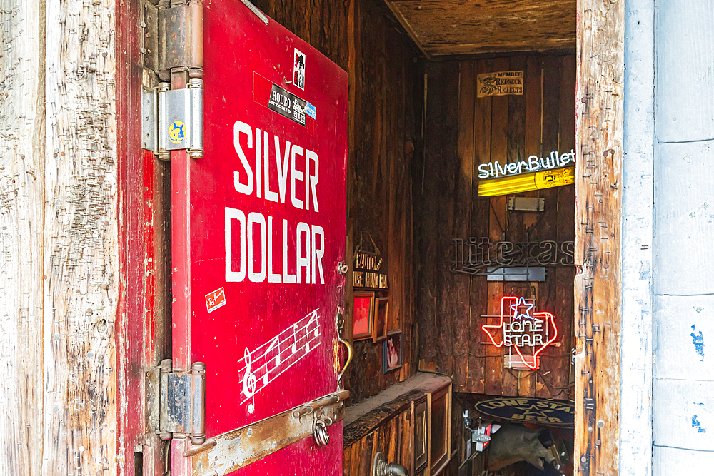 Bandera, Texas, USA. April 14, 2021. Door of the Silver Dollar saloon in the Texas hill country.