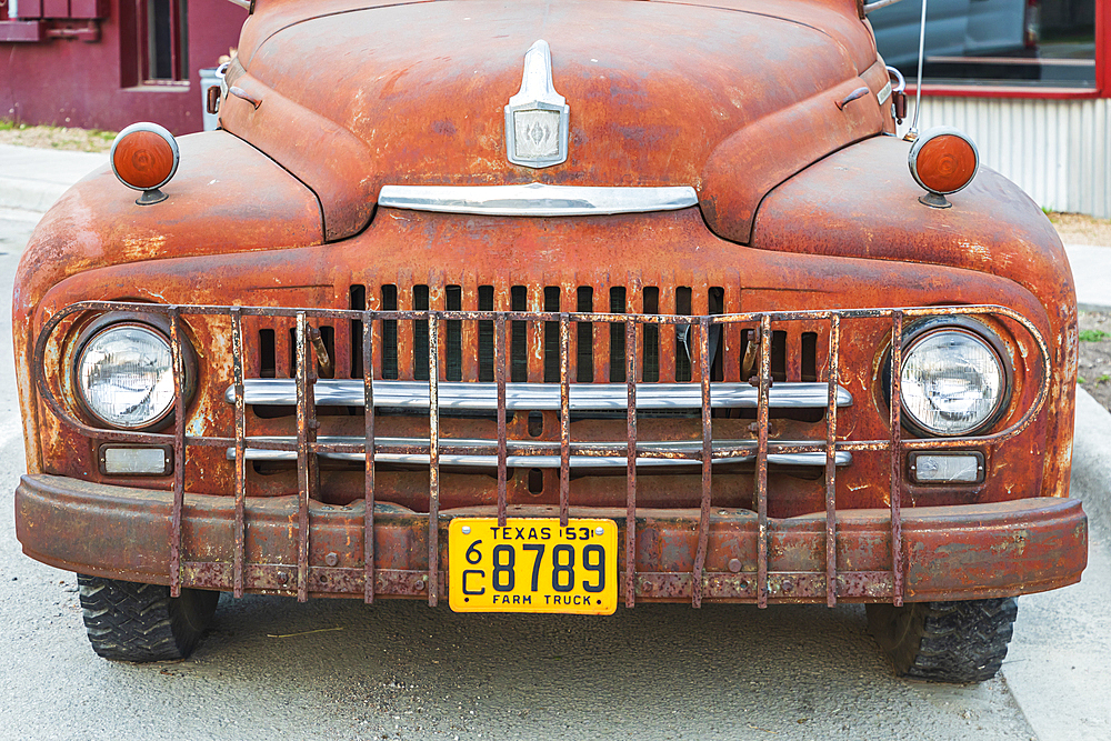 Blanco, Texas, USA. April 14, 2021. The grill of a rusted vintage pickup truck in Texas.