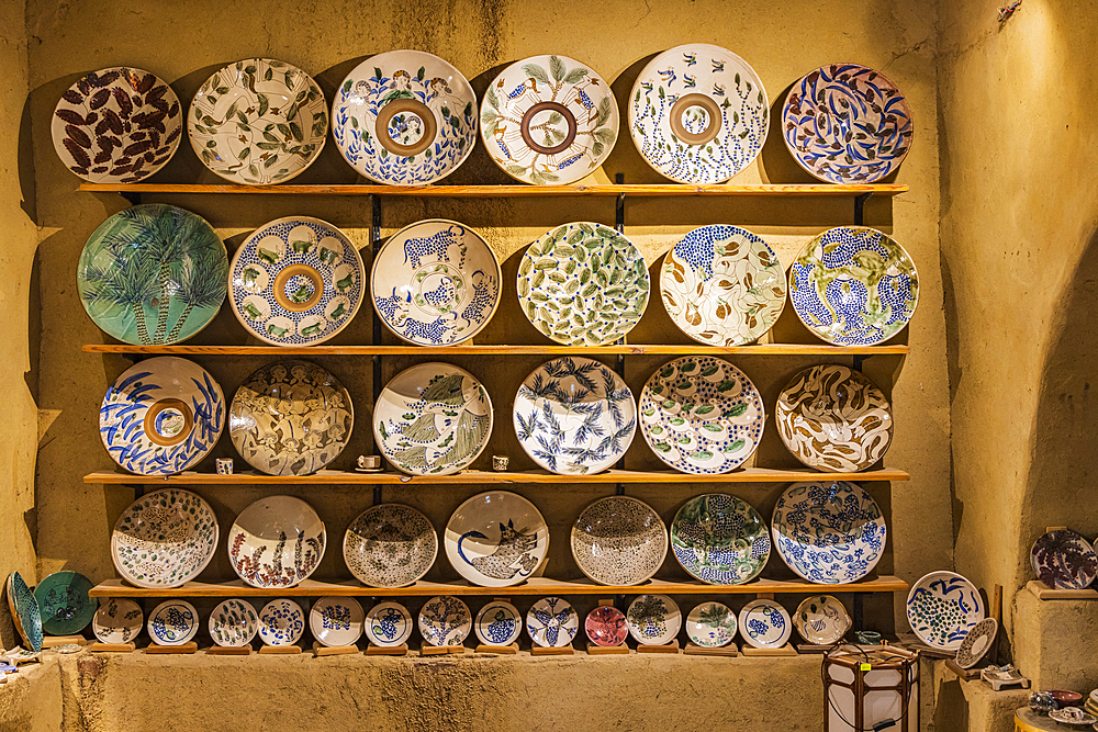 Faiyum, Egypt. February 19, 2022. Plates for sale at a ceramic shop in Faiyum.