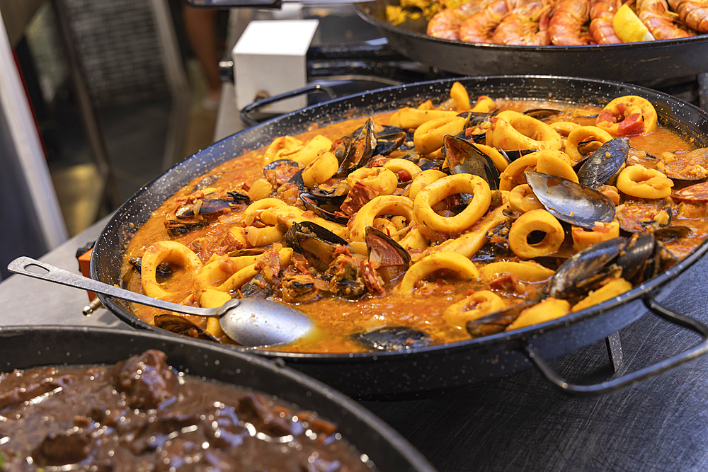 Saintes-Maries-de-la-Mer, Bouches-du-Rhone, Provence-Alpes-Cote d'Azur, France. Pot of bouillabaisse at a market in Provence.