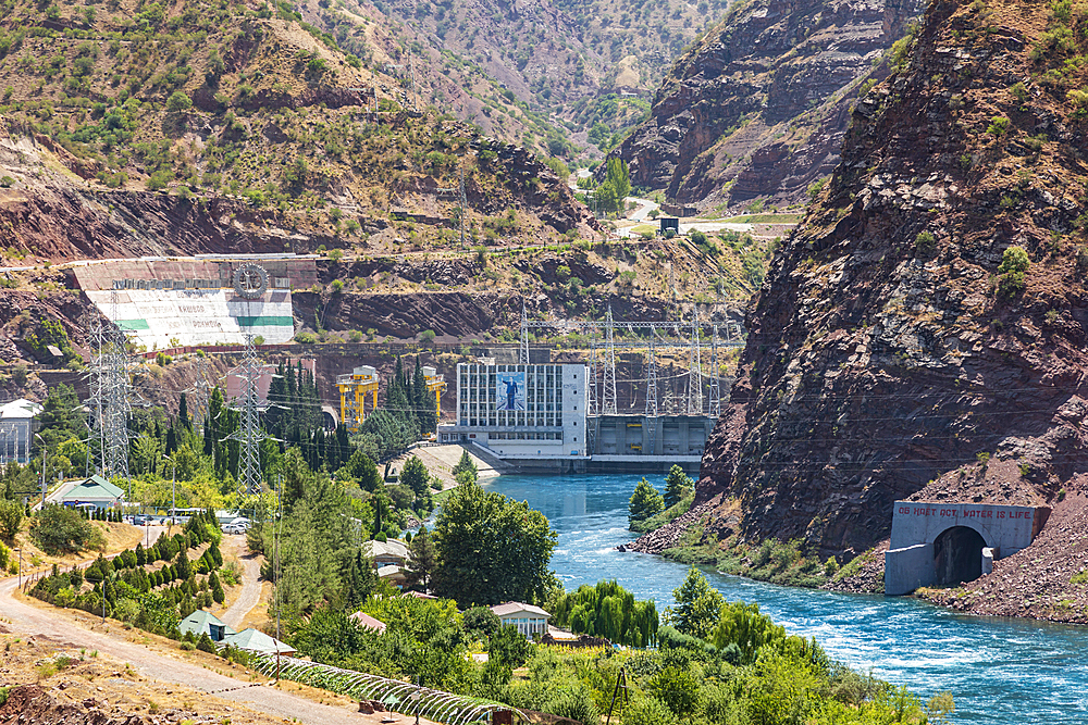 Nurek, Khatlon Province, Tajikistan. August 12, 2021. Powerhouse and electrical lines on the Nurek Dam, on the Kyzylsu River. Editorial Use Only