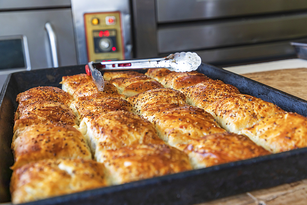 Panjakent, Sughd Province, Tajikistan. Freshly baked rolls for sale at the market in Panjakent.