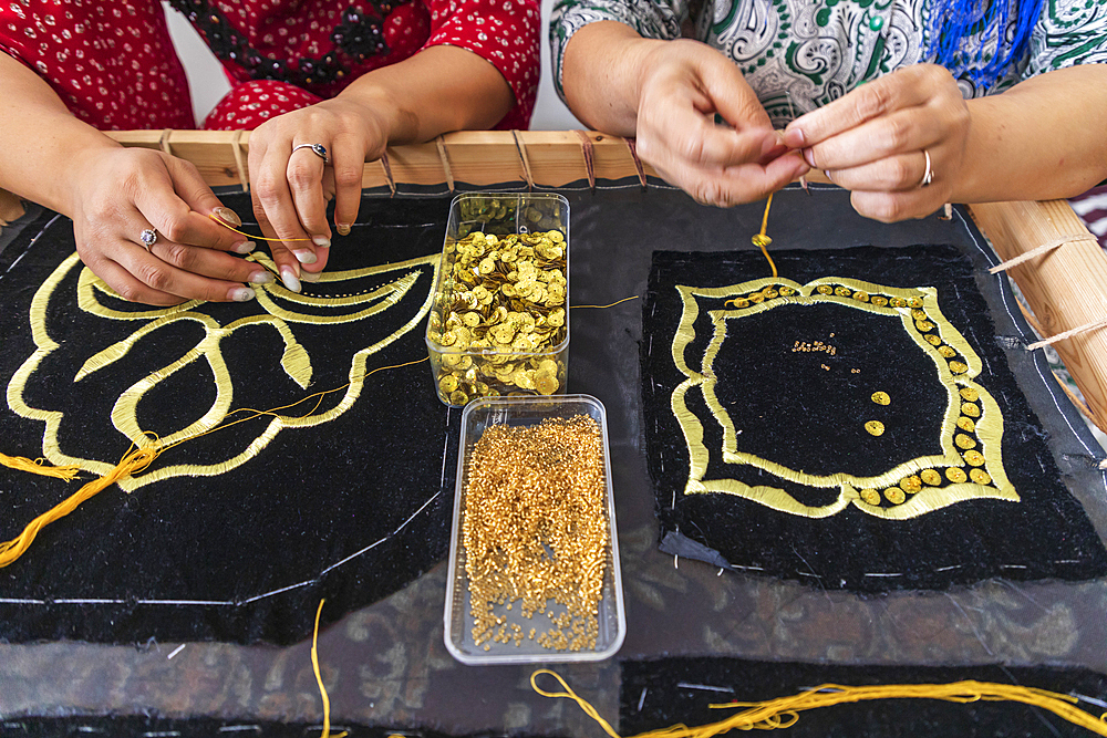 Panjakent, Sughd Province, Tajikistan. August 18, 2021. Craftsperson doing traditional needlework at the Historical Museum in Panjakent. Editorial Use Only