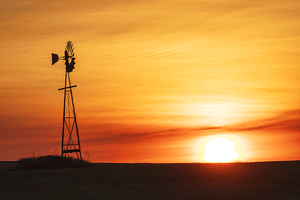 USA, Washington State, Whitman County. Windmill at sunset in the Palouse hills.