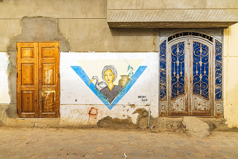 Faiyum, Egypt. February 19, 2022. Building decorated with murals in the village of Faiyum.