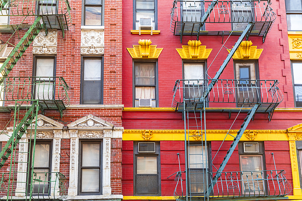 Chinatown, Manhattan, New York City, New York, USA. Fire escapes on buildings in Chinatown.