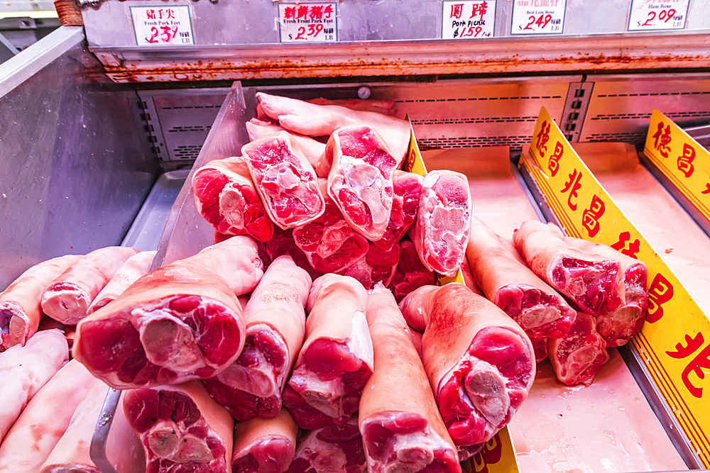 Chinatown, Manhattan, New York City, New York, USA. November 3, 2021. Raw pigs feet for sale in Chinatown.