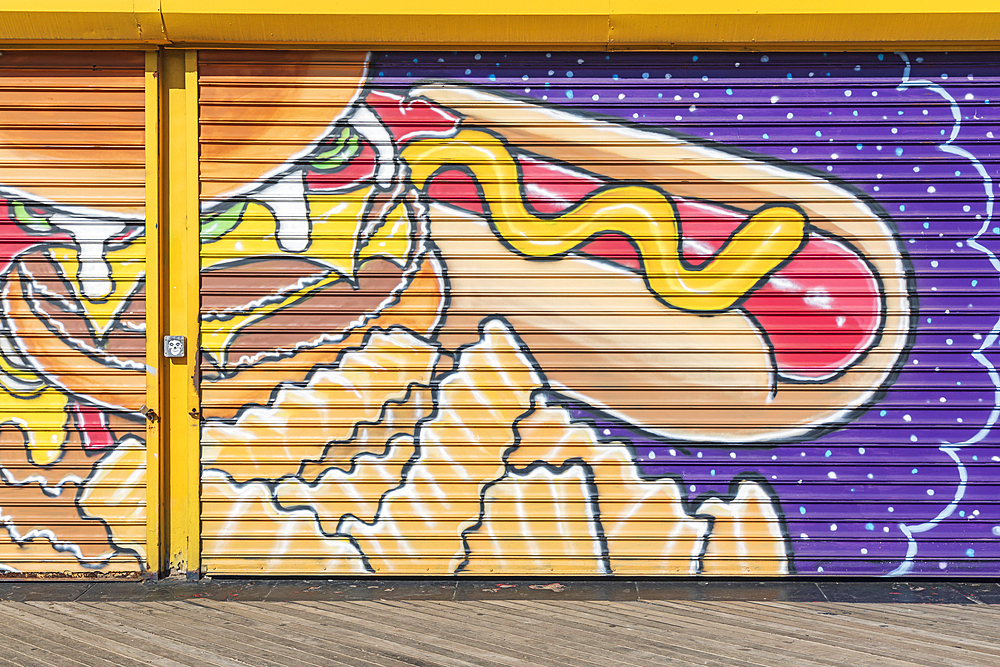 Coney Island, Brooklyn, New York City, New York, USA. November 6, 2021. Mural of a hot dog, hamburger, and french fries.