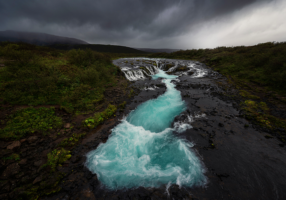 The bright blue Bruarfoss Waterfall in southern Iceland, Polar Regions