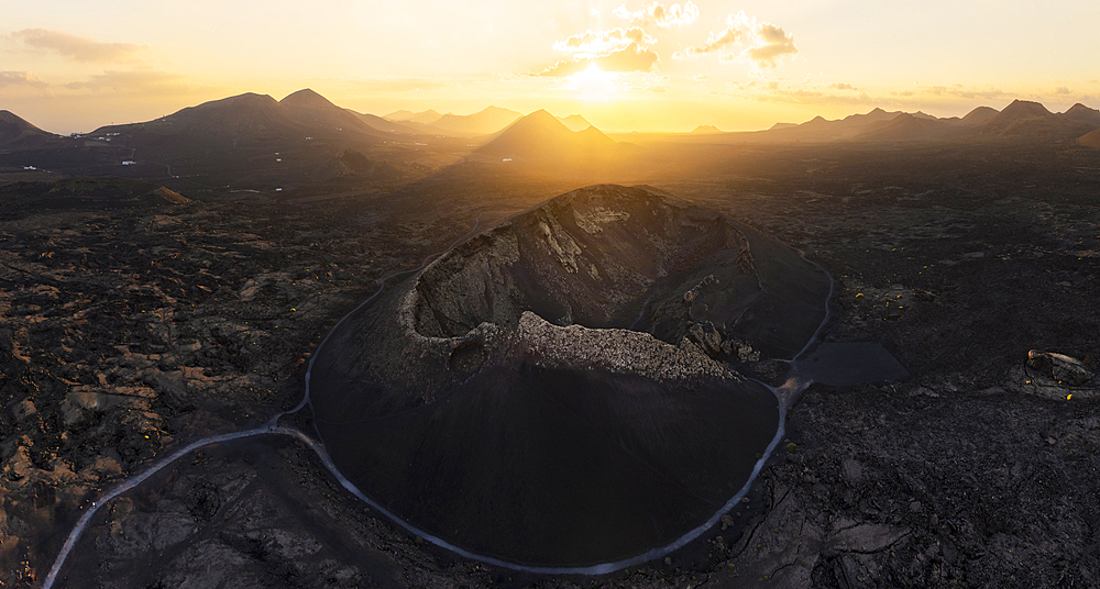 Aerial and panoramic view of Volcan El Cuervo at sunset, Tinajo, Las Palmas, Lanzarote, Canary Islands, Spain, Atlantic, Europe