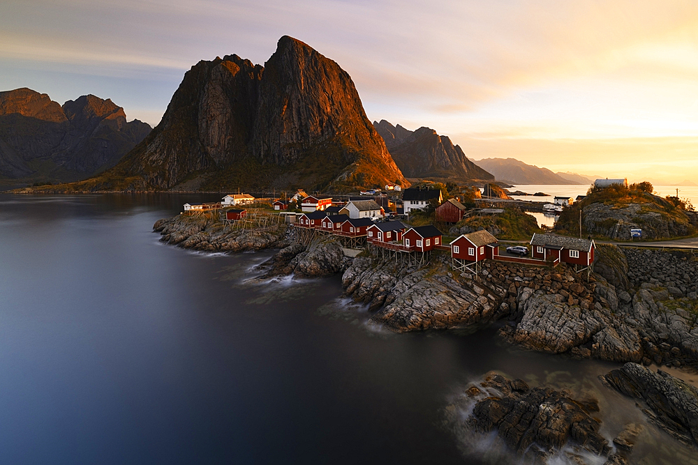 Long exposure to capture the warm light during an autumn sunrise in the fisherman village of Hamnoy, Lofoten Islands, Nordland, Norway, Scandinavia, Europe