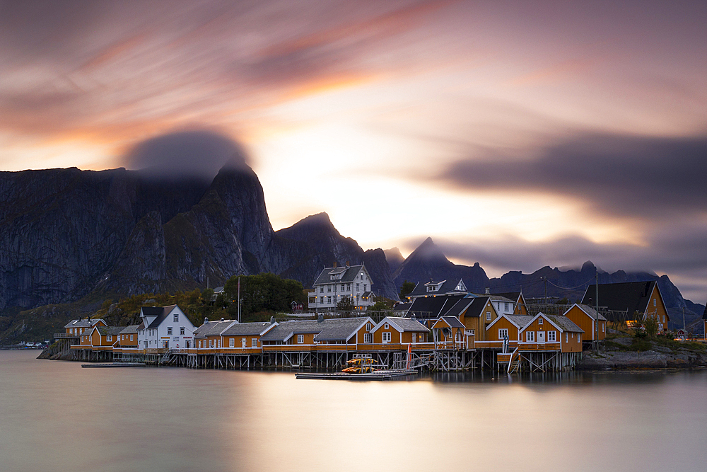 A long exposure to capture the warm light of sunset in Sakrisoy, during an autumn day, Reine, Moskenesoya, Lofoten Islands, Nordland, Norway, Scandinavia, Europe