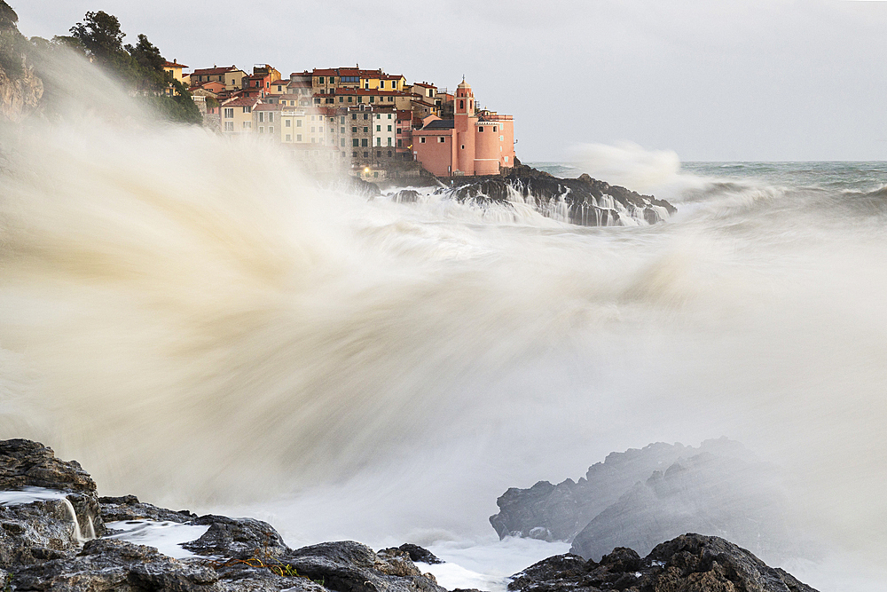 Big waves hit the famous fishing village of Tellaro during a strong sea storm, Lerici, La Spezia, Liguria, Italy, Europe