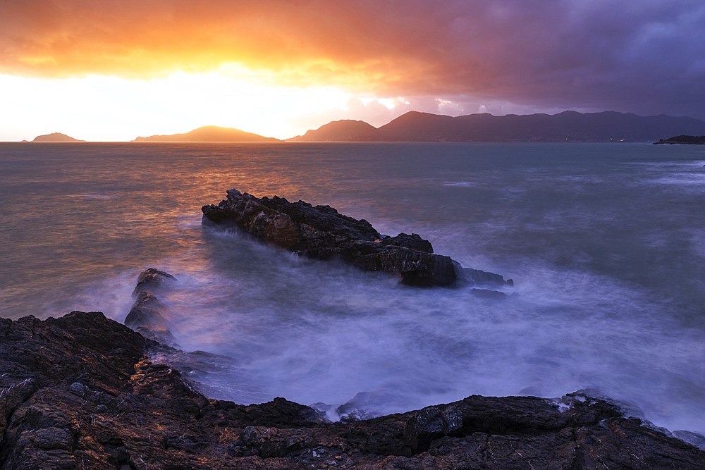 An amazing sunset captured along the Tellaro cliff during a winter day, Lerici, La Spezia province, Italy, Europe