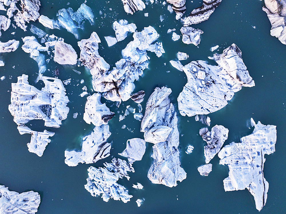 Aerial view taken by drone of iceberg in Jokusarloon Glacier Lagoon during a summer day, Iceland, Polar Regions