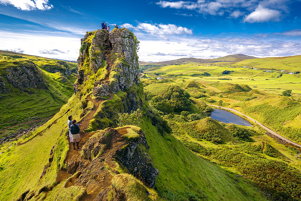 Tourists explore Fairy Glenn, Isle of Skye, Inner Hebrides, Scotland, United Kingdom, Europe