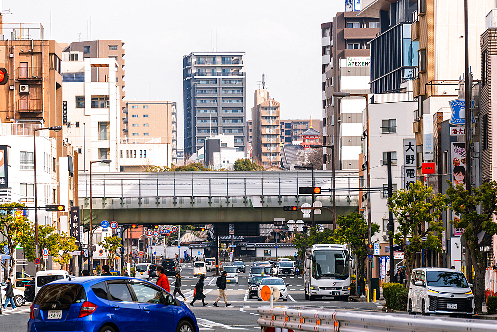 Busy intersection in Nipponbashi Denden Town Osaka, Kansai, Japan