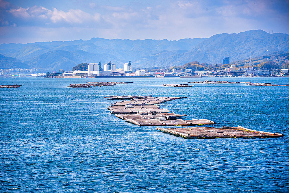 Oyster Farming Rafts Floating on the Seto Inland Sea Near Miyajima Island, a Renowned Seafood Region in Hiroshima Prefecture, Japan
