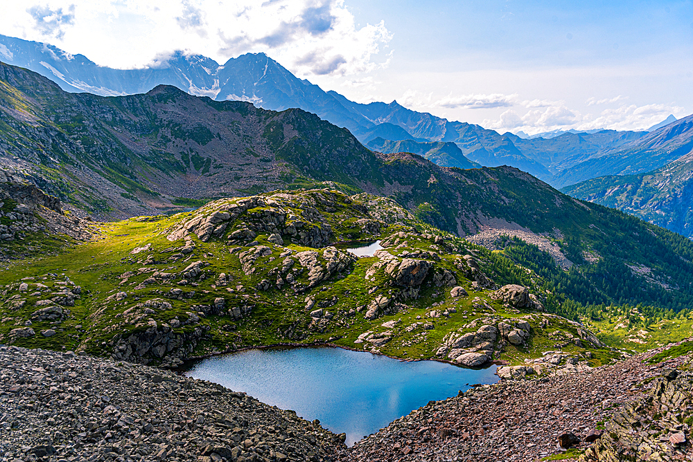 Beautiful nameless mountain lake view from Cima Verosso on the border of Italy and Switzerland, Zwischbergen, Valais, Switzerland, Europe