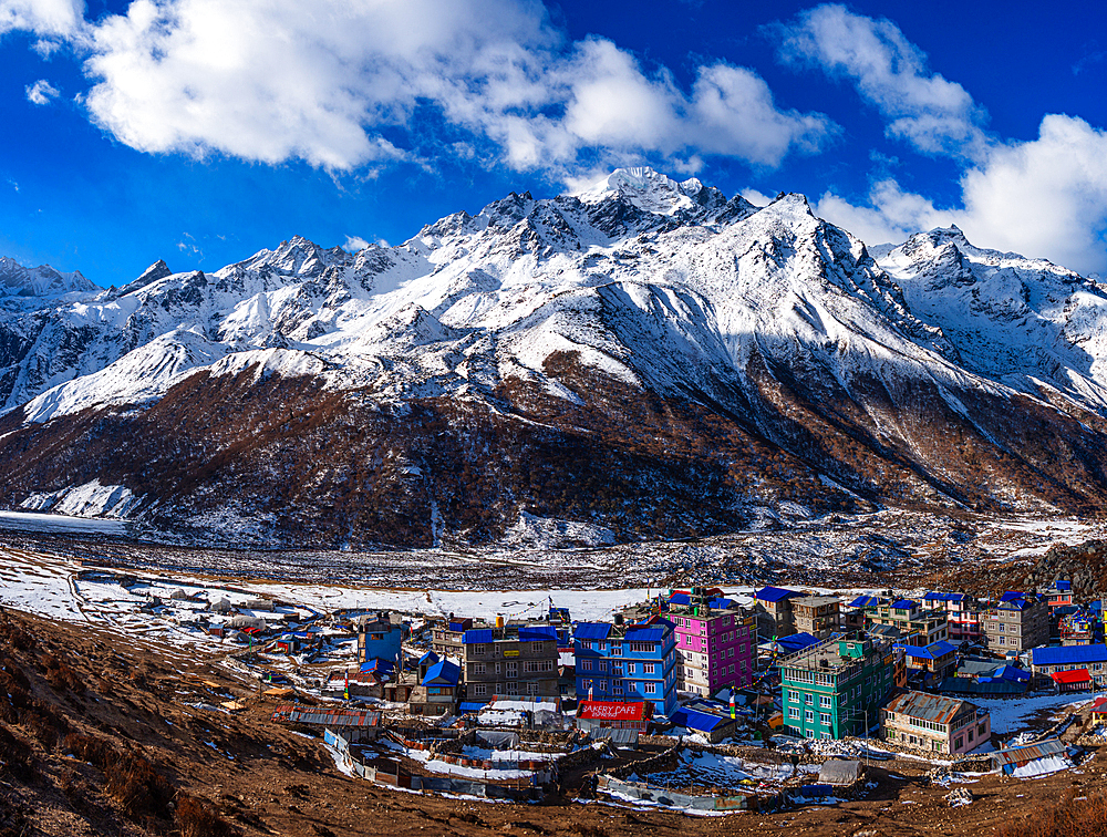 Panoramic View of Kyanjin Gompa Village with Colorful Rooftops Against Baden-Powell Peak in Snow-Covered Langtang Valley, Nepal
