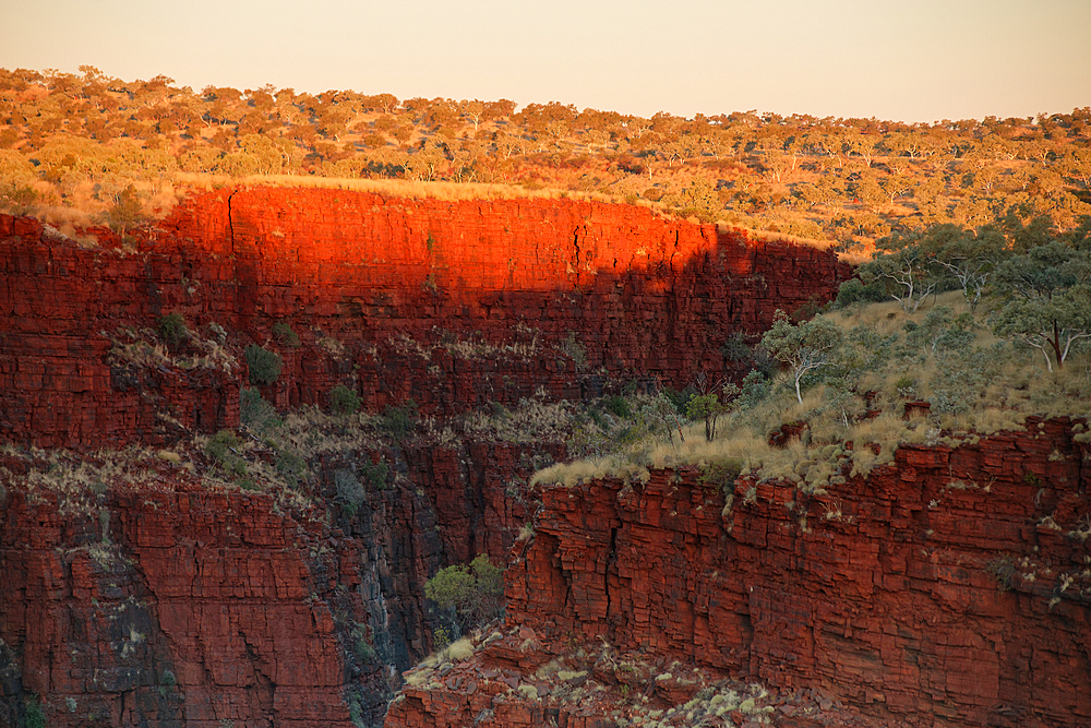 Sunset in the steep red rocky cliffs of Hancock Gorge in Western Australia, Australia, Pacific