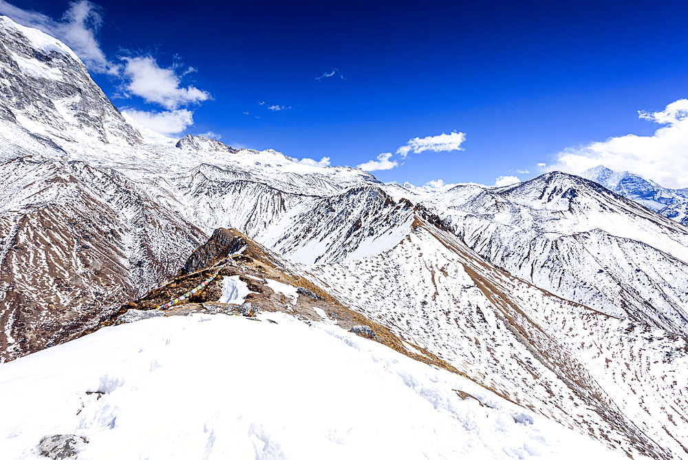 Snowy Ridge Leading Up to the Summit of Kyanjin Ri with Panoramic Views of the Langtang Himalayas and Pristine Valleys Below