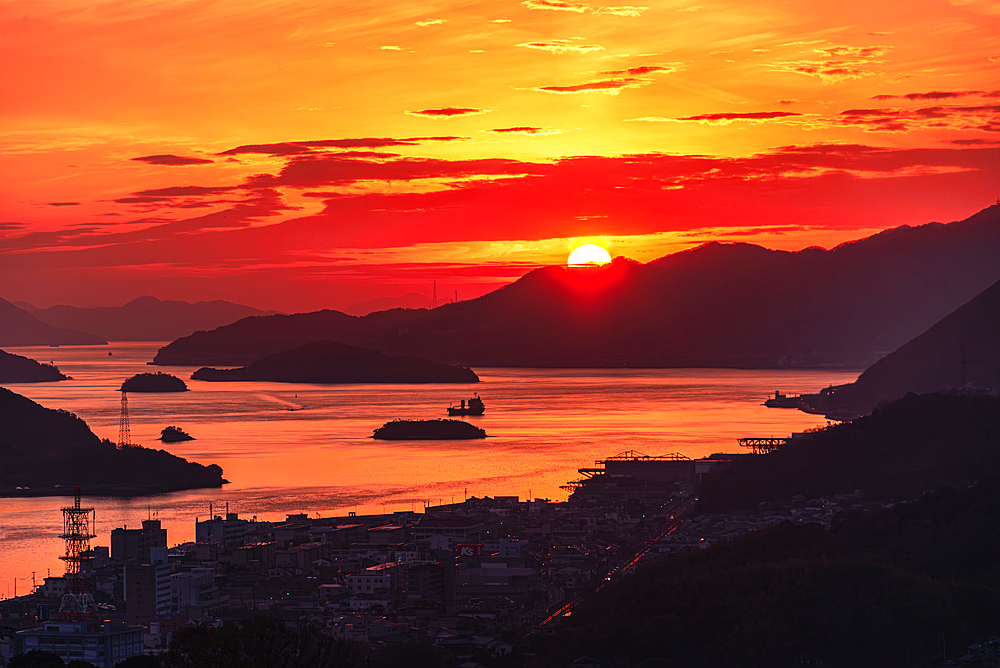 Dramatic red sunset above the bay of Onomichi, Onomichi, Honshu, Japan, Asia