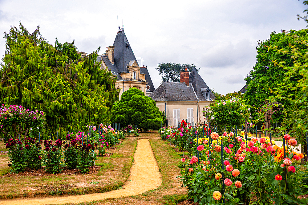 Thabor Gardens with blooming flowers and scenic paths leading to pavilion in Rennes Brittany France