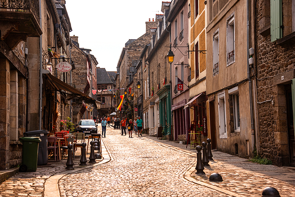 Rue du Jerzual cobbled street with cafes and boutiques in medieval Dinan Brittany France