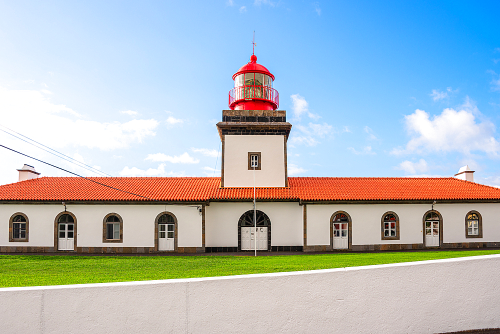 The Farol da Ponta das Lajes Lighthouse on the Flores Island, Azores, Portugal. It guides ships through the North Atlantic waters.