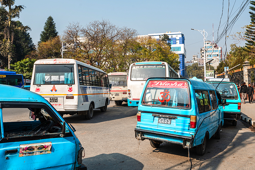 Different types of public transport buses ready to be boarded at New Road, Kathmandu, Nepal, Asia