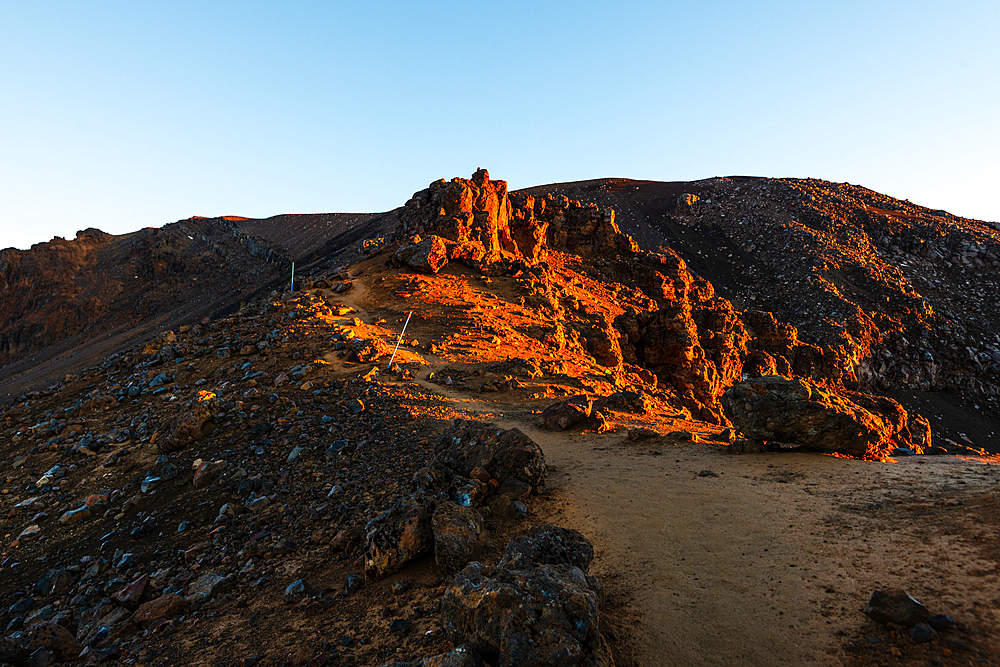 Rocky volcanic landscape on the Tongariro alpine Crossing,lit by the sunrise, North Island, New Zealand, Pacific