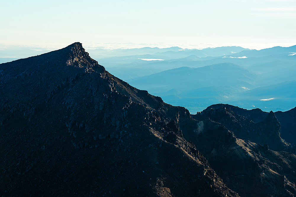 Morning light on the rugged volcanic slopes and the vast countryside of New Zealand Tongariro Crossing, North Island, New Zealand, Pacific