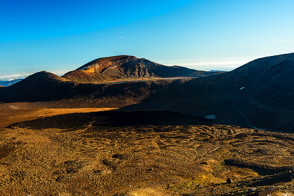 Dry volcanic landscape on the summit plain on Tongariro Alpine Crossing, Tongariro National Park, UNESCO World Heritage Site, North Island, New Zealand, Pacific